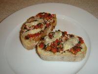 klicken Sie hier um das
Bild grösser anzuzeigen bruschetta_mit_tomate_schinken01.jpg